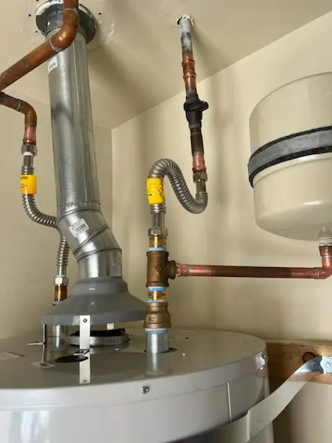 Water heater installation and plumbing repair in Crown Manor